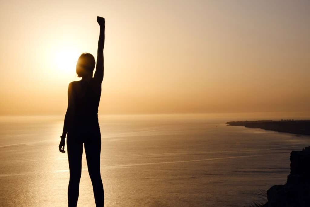 Silhouette of empowered woman